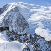 The Cosmiques hut from the base of the Cosmiques ridge climb.
