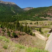 Looking on the lower side of the dam.  The road we take next goes up the valley in the center of the photo.