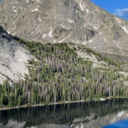 While the lake is calm, it was very windy on the shoulder of Haystack while we approached our objective.