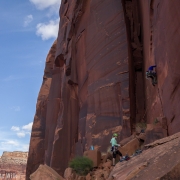 Carly give the lead end of the rope a try on an unnamed 5.10.
