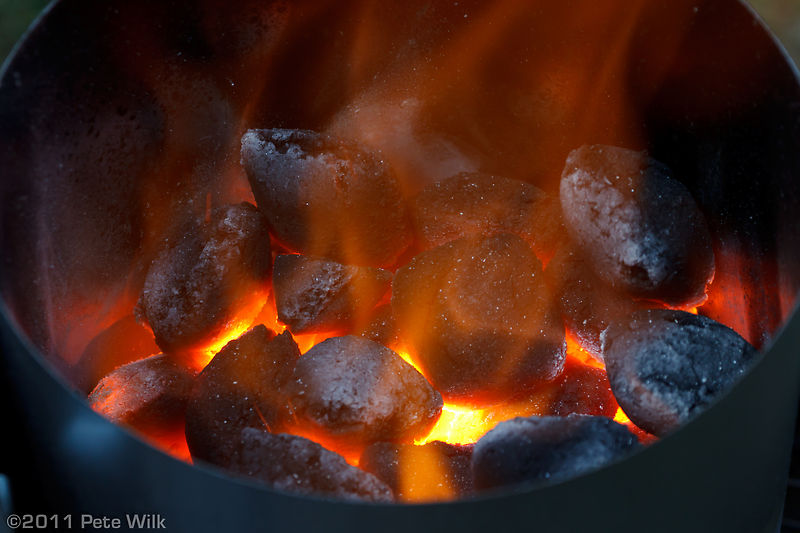 Charcoal firing up for steaks.