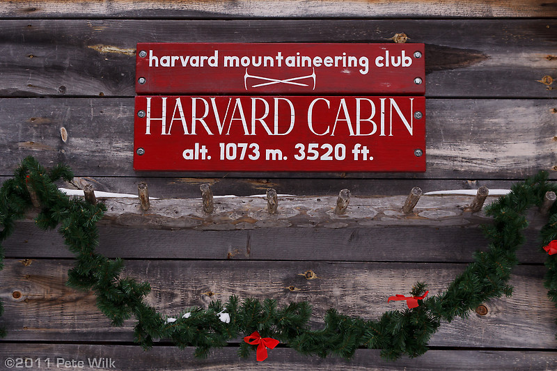 Sign on the outside of Harvard Cabin.