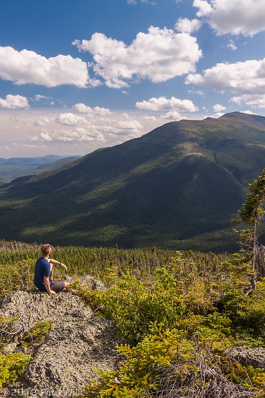 Me basking in the sun on the shoulder of Mt. Madison.