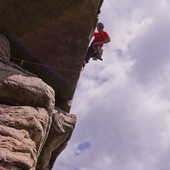 Mark working the crux of High E (5.6)