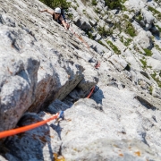 Higher up on the face of the Lowe Route (5.8).