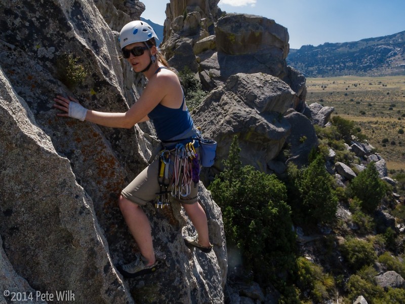 Carly making the slabby traverse over to the chains.
