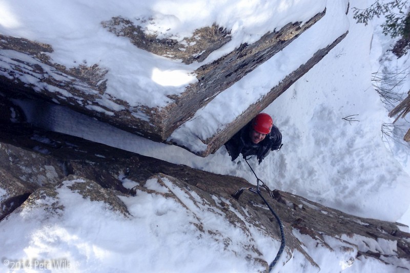 A dubious look from Chris about the 20 ft of rock climbing needed to do the Pegasus Rock finish (WI3+ M3).