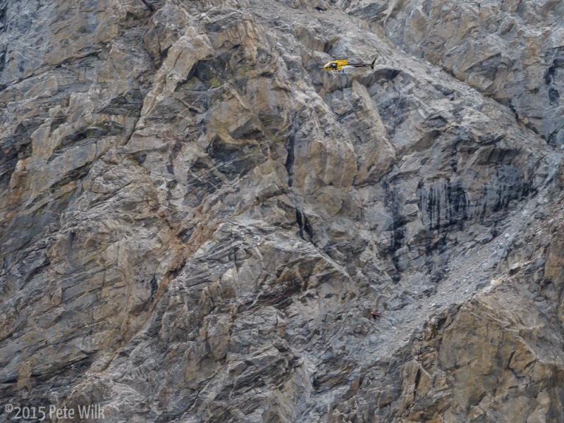 On the way down we heard some massive rockfall over on the northwest side of the Middle Teton.  About 45 minutes later we heard a rescue chopper.  While the rockfall was unrelated there was a climber injured on the other side of the mountain and was short-hauled out.  You can see them about 200 feet below the chopper.