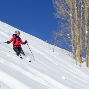 Carly making some turns on a bluebird day.