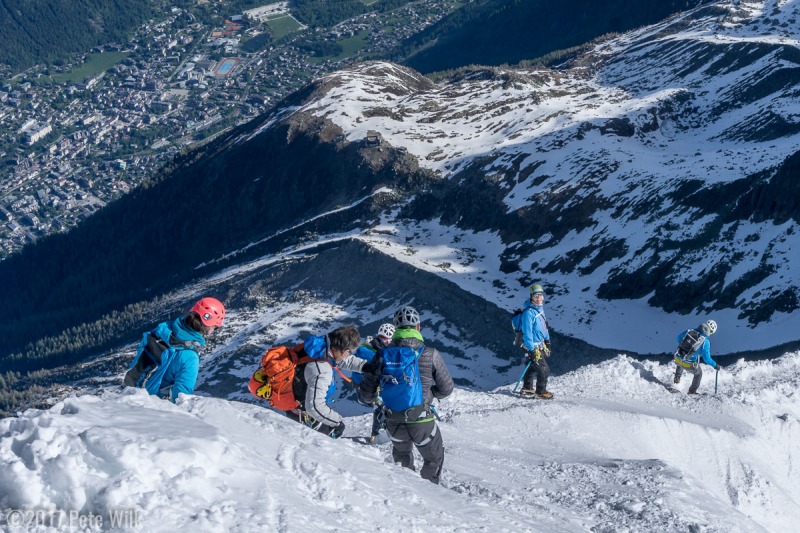 FX having a blast with the tiny town of Chamonix in the background.  Belcourt leading the way.