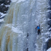 Doug bottoming out some 13cm screws on the harder line of High School Squids (WI4+).