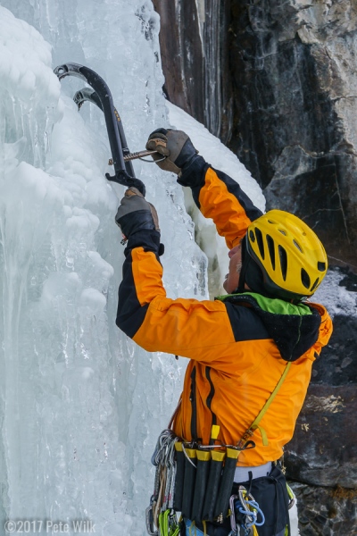 Manu placing a screw for a top rope.