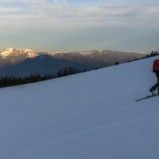 Skinning up the easy, but icy slopes down low.