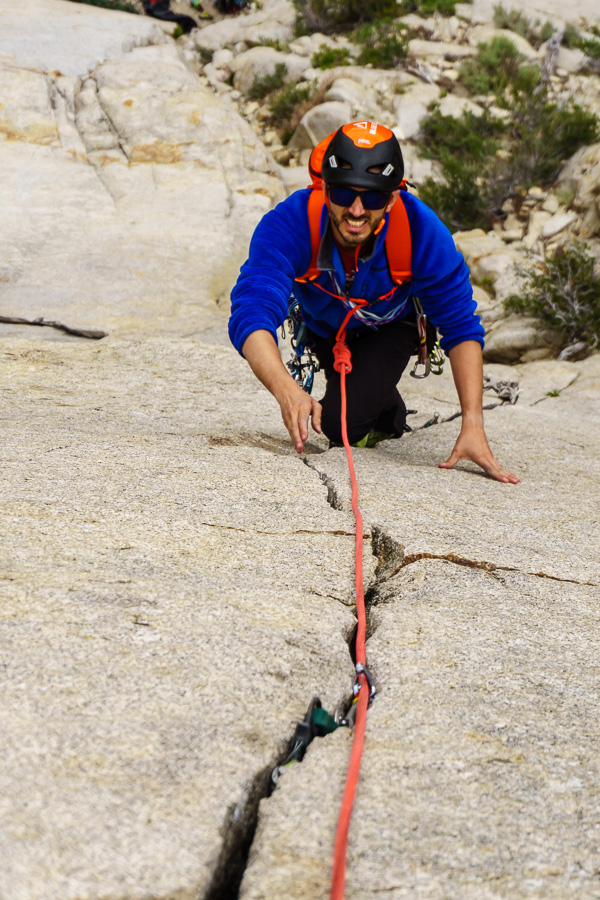 Giovanni going up the great finger crack on Racing Lizards (5.7).