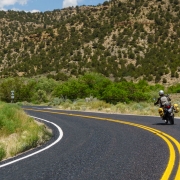 Andreas carving up the asphalt before getting on dirt on the way to Bruin Point.