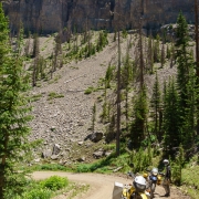 Short photo stop on the increadibly windy road up from the dam to a high alpine pass.  The road is under this cliff band for most of the way.