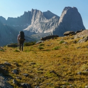 Almost there.  Topping out Jackass Pass with Pingora and Wolf\'s Head in the late day sun.