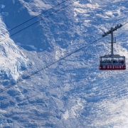 A packed cable car on the Brevent side.