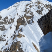 The rest of the ridge we didn't do.  At this point there's an overhung rock face topping out onto an unknown height snow mushroom.