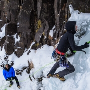 The Matts climbing and belaying on the Elevator Shaft (WI4).