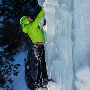 Doug planning his line on a wet Killer Pillar (WI5).