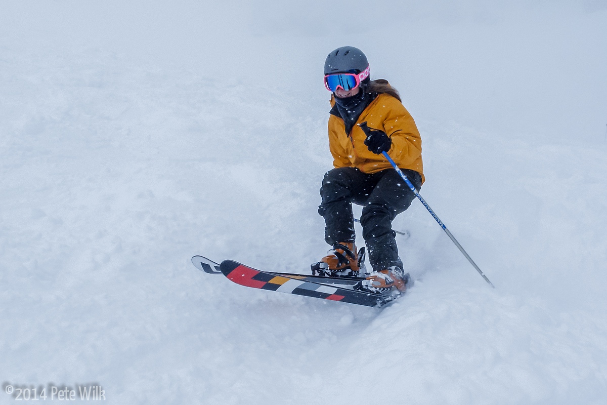 Carly ripping it through the powder on Christmas Day at Snowbird.
