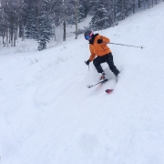 Carly ripping it through the powder on Christmas Day at Snowbird.