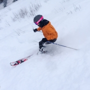 Carly ripping it through the powder on Christmas Day at Snowbird.