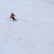 Carly ripping it through the powder on Christmas Day at Snowbird.