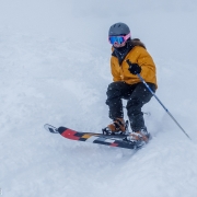 Carly ripping it through the powder on Christmas Day at Snowbird.