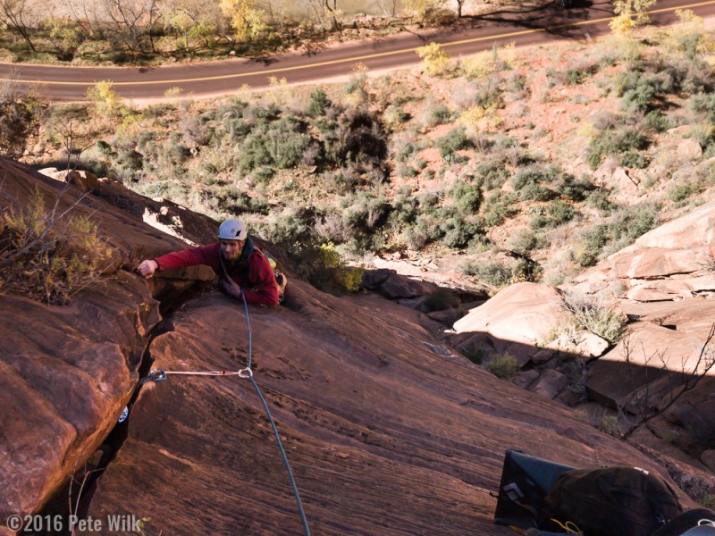 The money second pitch starts as unprotected 5.7 slab and moves to a technical face with spaced bolts.  A finger crack begins after the face and turns quickly into a hand and fist crack.  It is 170 ft of great climbing that I need to go back to do.