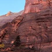 There she is, Desert Shield (5.11a C3).  The line goes up from off frame to the left, to the top of the pillar, where the bivy ledge is, to the left edge of the overhanging headwall.  Once gaining the headwall from the left side it wraps around to the overhanging face in the center.