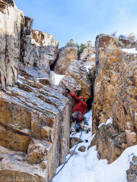 Matt on our P3 which was the last pitch.  This was the only really tricky move.  Luckily there\'s a nice #2 camalot crack right here.