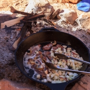 Cooking breakfast like the coyboys did.  A NO match fire as there were still some coals from the previous night.