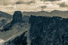 The approach to Chimney Rock, left, brings one to a saddle and a eye level view of the feature and the knife edge ridge that once connected it to Mt. Roothaan.
