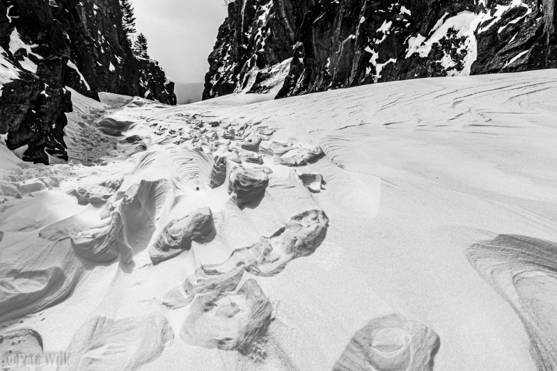 Interesting snow patterns near Crawford Notch.  Footprints compressing the snow later had the surrounding snow erroded by the wind.