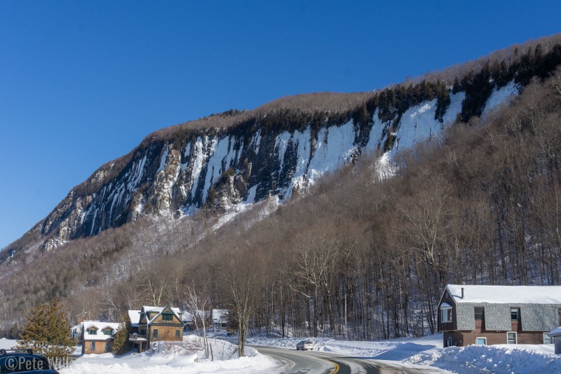 View of Lake Willoughby's walls from the parking in the village.  For scale, the climbs on the right are about 60-70m pitches.