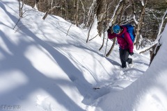 Carly breaking trail up to the base of Goofer's (WI3).