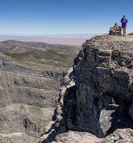 Summit cairn and the top of the cliff.