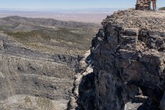 Summit cairn and the top of the cliff.