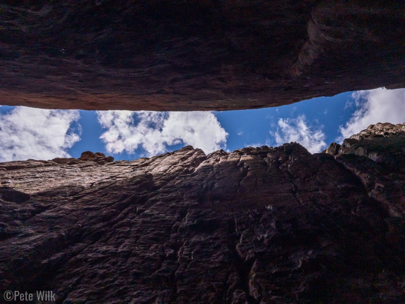 Looking up from near the bottom of the slot.  Walls are about 70-80 feet tall.