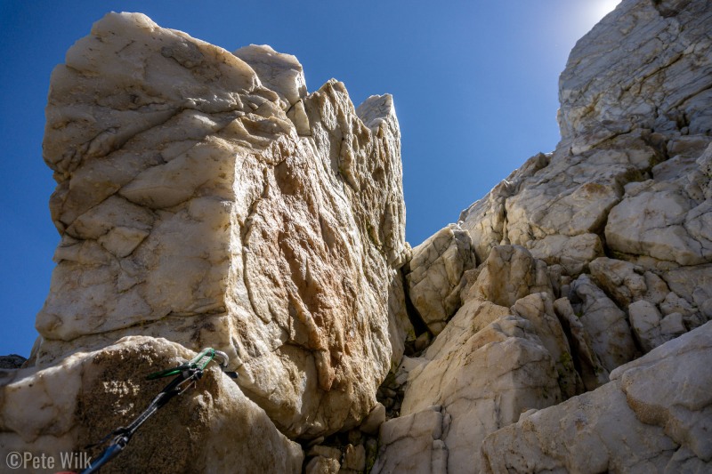 This route ascends a massive vein of quartz on the apply named Crystal Crag.