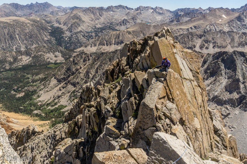 Carly going au chaval, on the ridgeline climbing.