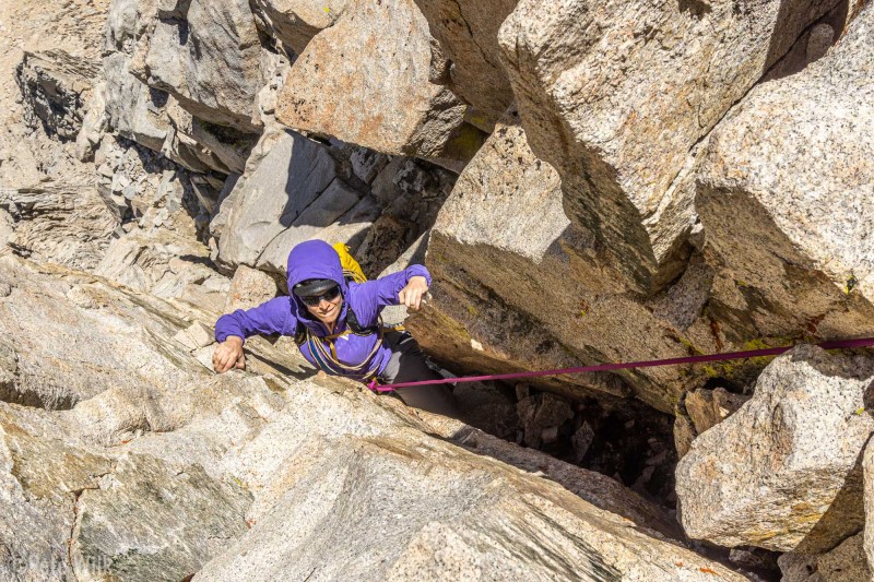 Carly squeezing up through a chimney around P9 or P10.