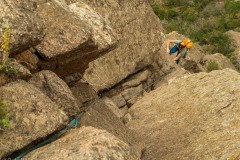 Micah coming up to the belay on P2 of Maiden Voyage (5.9).