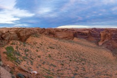 Panoramic from the Crack-in-the-Rock.  The dark wide crack at bottom left is how the trail goes from the rim to the sand.