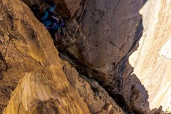 In the shade behind the big pillar that is 3/4 up the route.