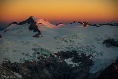 Sun hitting the top of Eldorado Peak.