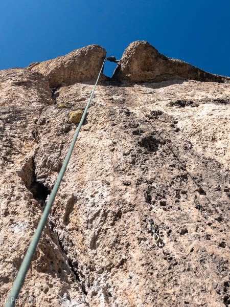 Beer Bond (5.10a).  Carly's on a top rope, not running it all the way to the chains.