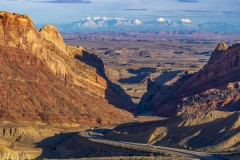View from Spotted Wolf Overlook, which views the breach in the San Rafael Reef made in the late 1960's for Interstate 70.  La Sal mountains in the distance with snow.